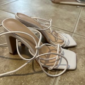 Strappy white heels
